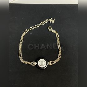 Chanel Черно-белые круглые пуговицы, браслет из смолы