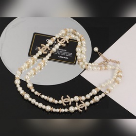 Chanel Жемчужное ожерелье с двойным C-образным символом Chanel. О