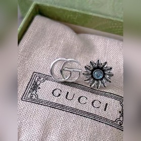 Оригинальные серьги Gucci в фирменном магазине. Серьги Gucci с дв