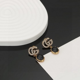 Популярные, известные, новые серьги Gucci. Модный бренд Gucci с и