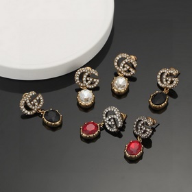 Популярные, известные, новые серьги Gucci. Модный бренд Gucci с и