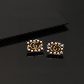 Серьги Gucci из серии Double G с жемчугом и цветными бриллиантами
