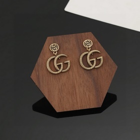 Gucci Серьги с двойным логотипом G. Высококачественный латунь, со
