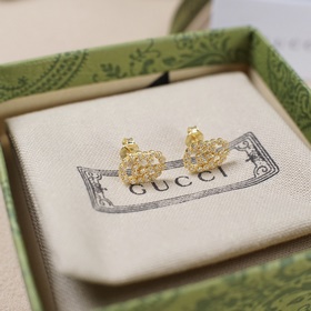 Серьги Gucci с буквами «GG» из золота и бриллиантамиз коллекции R