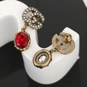 Популярные, известные, новые серьги Gucci. Модный бренд Gucci с и