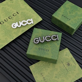 Зажим для волос Gucci с двойной буквой G Незаменимый аксессуар дл