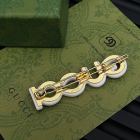 Зажим для волос Gucci с двойной буквой G Незаменимый аксессуар дл