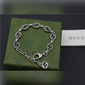 Брендовое украшение Gucci Браслет с двойной буквой G и рельефным