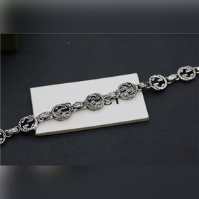 Брендовое украшение Gucci Браслет с двойной буквой G и рельефным 