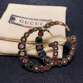 Новые броши с ретро-бриллиантами от Gucci, представленные в магаз
