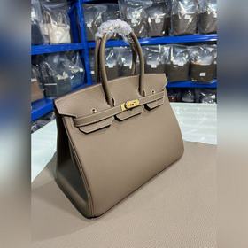 Фотографииз мастерской Birkin Platinum, слоновая кость с золотой