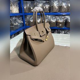 Фотографииз мастерской Birkin Platinum, слоновая кость с золотой 