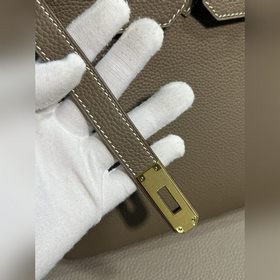 Фотографииз мастерской Birkin Platinum, слоновая кость с золотой 