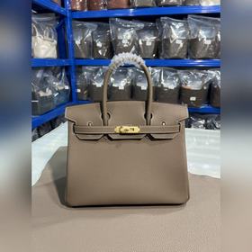 Фотографииз мастерской Birkin Platinum, слоновая кость с золотой