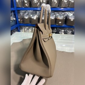 Фотографииз мастерской Birkin Platinum, слоновая кость с золотой