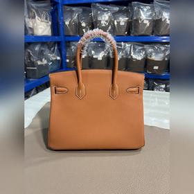 Фотографииз мастерской Birkin Platinum, золотисто-коричневая золо