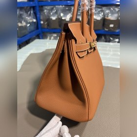Фотографииз мастерской Birkin Platinum, золотисто-коричневая золо