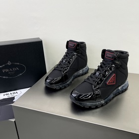 Prada/Prada PRAX Лосины из лакированной кожи с тканевыми вставкам