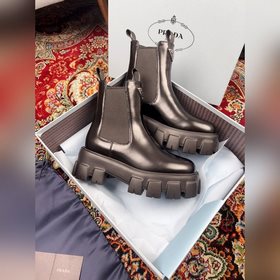 PRADA ПРАДА Ботинки на толстой подошве с карманами треугольным ло