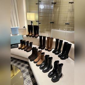 PRADA Классические ботинки с треугольным логотипом. Это модель, к