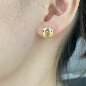 9 2 5 7670130 Серьги Tiffany с желтым бриллиантом в четырех когтя