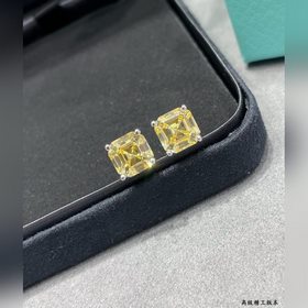 9 2 5 7670130 Серьги Tiffany с желтым бриллиантом в четырех когтя