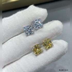 9 2 5 7670130 Серьги Tiffany с желтым бриллиантом в четырех когтя