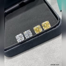 9 2 5 7670130 Серьги Tiffany с желтым бриллиантом в четырех когтя