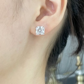 9 2 5 7670130 Белые бриллиантовые серьги Tiffany с четырехконечны