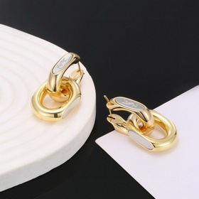 Золотые серьги Saint Laurent YSL — классическая роскошь, модный и