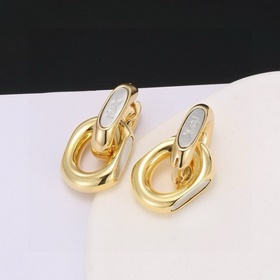 Золотые серьги Saint Laurent YSL — классическая роскошь, модный и