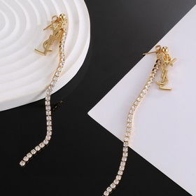 YSL Saint Laurent серьги-гвоздикиз оригинального латунного матери