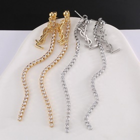 YSL Saint Laurent серьги-гвоздикиз оригинального латунного матери