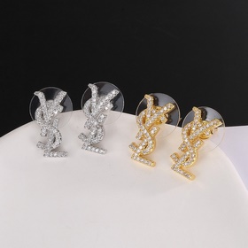 YSL Saint Laurent серьги-гвоздикиз оригинального латунного матери