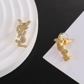 YSL Saint Laurent серьги-гвоздикиз оригинального латунного матери