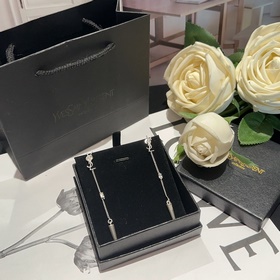 Сережки с кисточками Saint Laurent с подвеской в форме пули