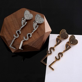 YSL Saint Laurent Серьги-клипсы из оригинального латунного матери