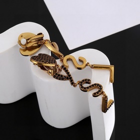 YSL Saint Laurent Серьги-клипсы из оригинального латунного матери
