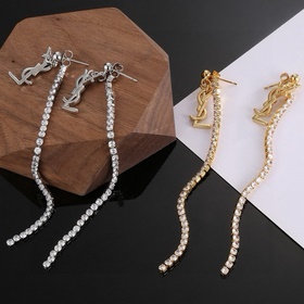 YSL Saint Laurent серьги-гвоздикиз оригинального латунного матери