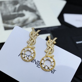 YSL Saint Laurent серьги с бриллиантами. Yves Saint Laurent был о