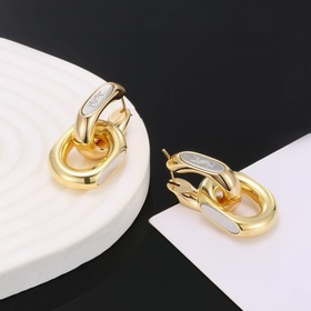 Золотые серьги Saint Laurent YSL — классическая роскошь, модный и