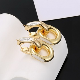 Золотые серьги Saint Laurent YSL — классическая роскошь, модный и