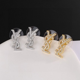 YSL Saint Laurent серьги-гвоздикиз оригинального латунного матери