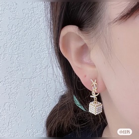 Сережки Saint Laurent YSL — классическая роскошь, модный аксессуа