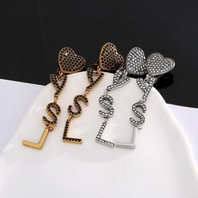YSL Saint Laurent Серьги-клипсы из оригинальной латуни. Yves Sain
