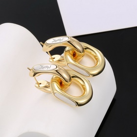 Золотые серьги Saint Laurent YSL — классическая роскошь, модный и