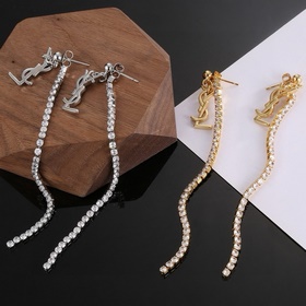 YSL Saint Laurent серьги-гвоздикиз оригинального латунного матери