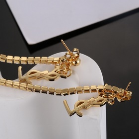 YSL Saint Laurent серьги-гвоздикиз оригинального латунного матери