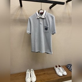 Gucci, ограниченная серия короткорукавных поло с изображением зме