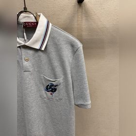 Gucci, ограниченная серия короткорукавных поло с изображением зме